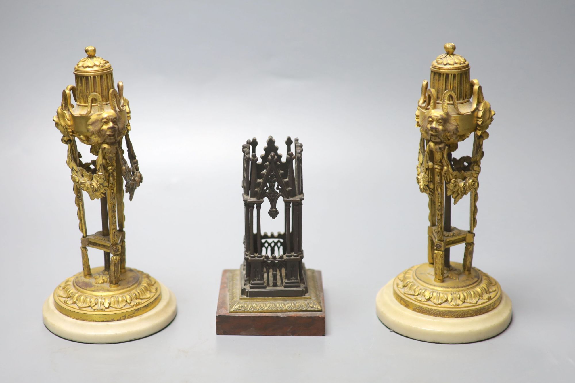 A pair of Louis XVI revival ormolu mantel ornaments, 20.5cm and a neo-Gothic bronze spill vase, 19th century, 13.5cm